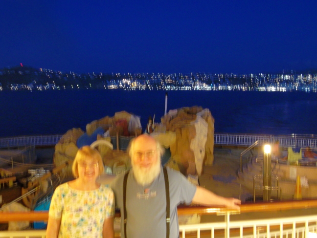  Shore lights of Mykonos as our ship sails on