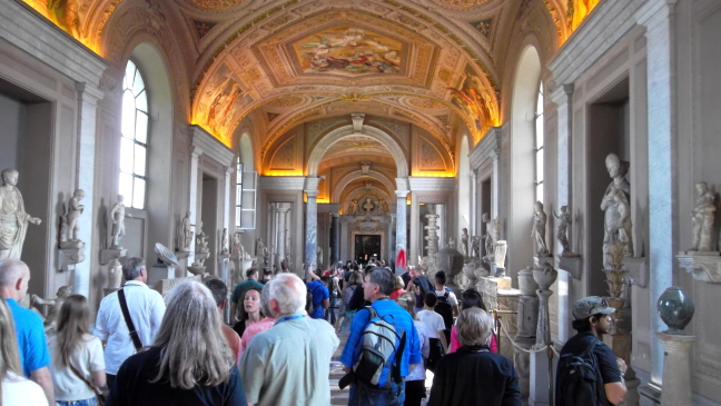  One of the many galleries to be traversed to attain the Sistine Chapel; statuary seems to exceed paintings