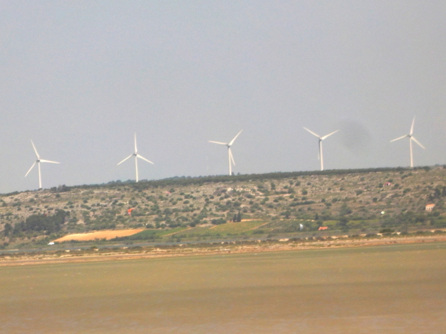  Wind power looms over salt marsh in the C\xc3\xb4te d'Azur, France