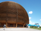  The dome at CERN houses a unique multimedia display of CERN&s mission and accomplishments.   The blue tube is a section of the CERN accelerator ring. There are 9000 like it in the ring. It is curved by 2 millimeters.