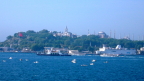  On land in European Istanbul: the Turkish flag at the Ataturk monument, Topkapi Palace, Hagia Sophia (Sacred Wisdom), and the Blue Mosque;  afloat: three of the myriad ferries, fishing boats, a yacht