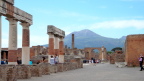  Vesuvius dominates the western skyline from the forum in Pompei. The eruption in 79 AD had been presaged by an earthquake in 62 AD. Much of the forum had been rebuilt in the interim.