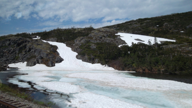  June, 85 degrees, and still ice and snow on White Horse Pass