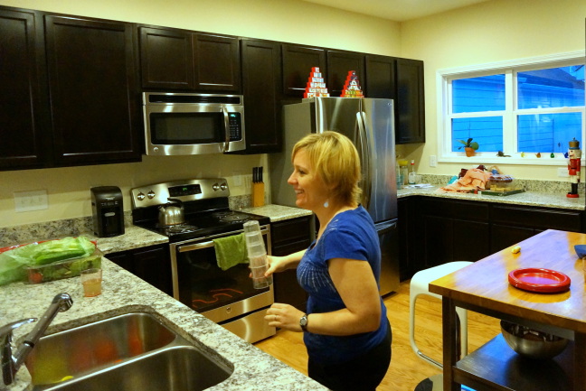  Tanya enjoys company and her new kitchen