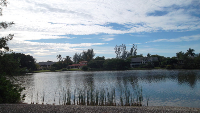  The view across one of the dozen ponds encircled by Sandcastle Road, Sanibal FL