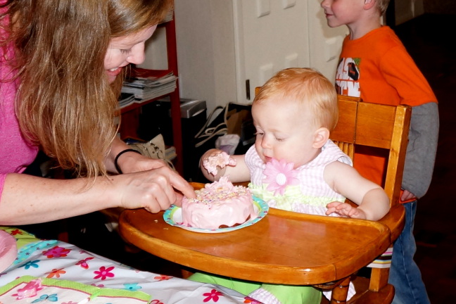  Big folks call this a smash cake imagining a happy child wallowing happily in a mess of frosting