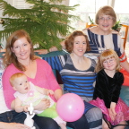  That's me in momma Ellyn's lap with cousin Lindsay in Aunt Rebecca's lap and proud Grandma beaming