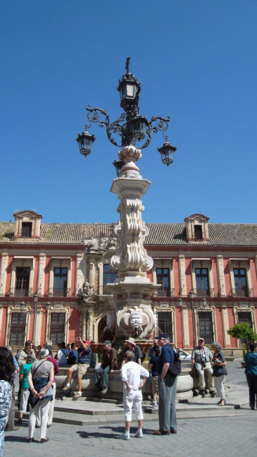  Our tour group assembles at fountain near cathedral, Sevilla