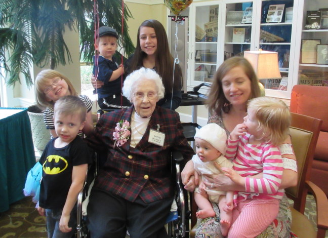 Edith surrounded by her great-grandkids