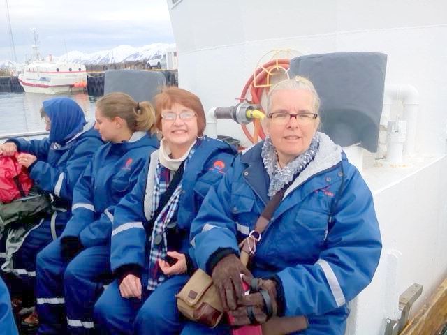 All suited up for whale-watching and fishing in the fjord