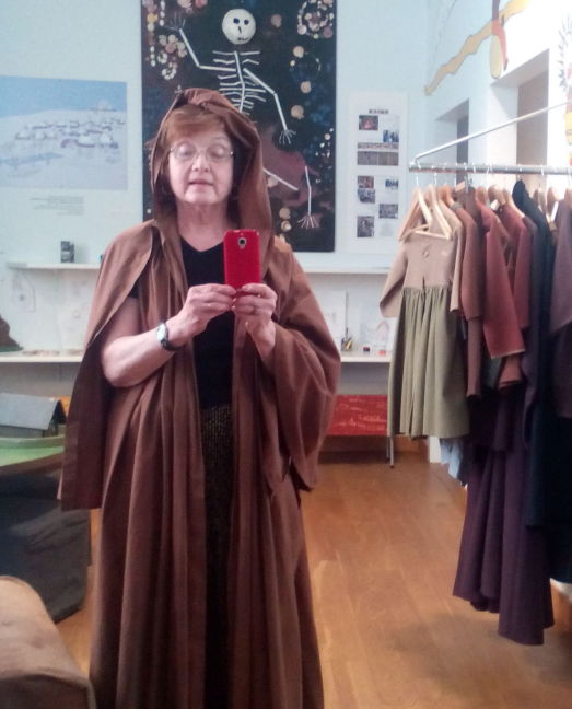 Trying on medieval clothing at Reykjavik National Museum