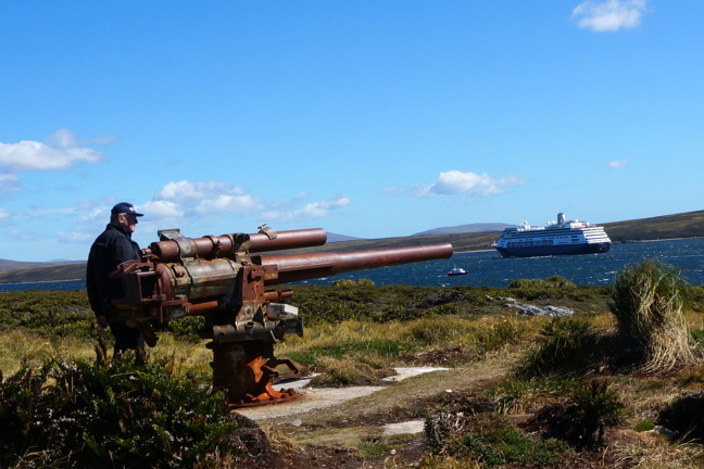 WW II cannon greets 21st century cruise ship in the Falklands