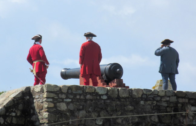 Firing the noonday cannon, Fort Louisburg