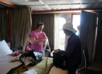  Rebecca preparing to venture forth into the afternoon sun from our stateroom
