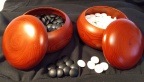  glass stones in wood bowls (? Chinese quince)
