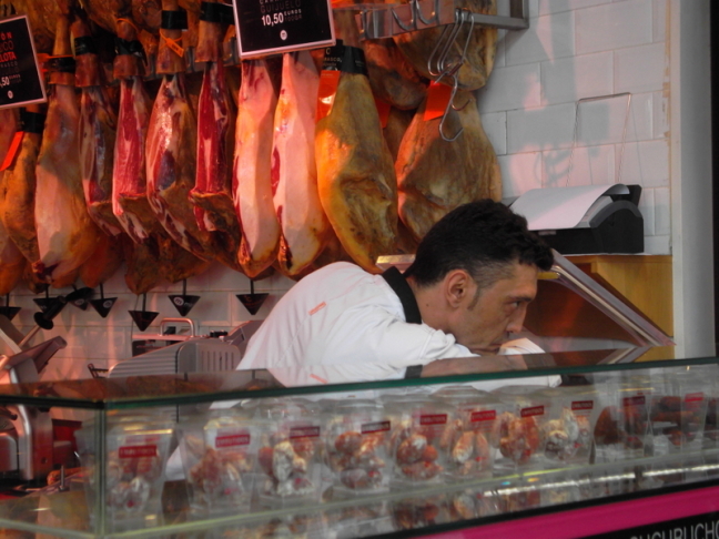 Waiting for someone to buy Iberian ham; Mercado, Old City, Jerusalem