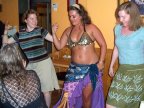 Bex and Ellyn study the belly dancer's moves 