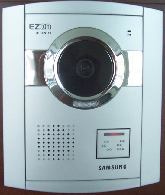 To visit us, you ring our doorbell. The big eye is a TV cam sending your picture to us