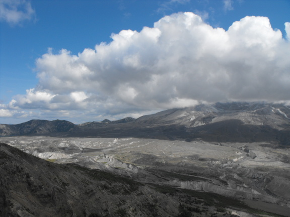  Mt. St. Helens at the right; lava flood plain below