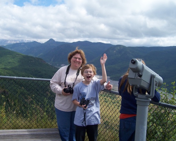  Wyatt enthusiastically poses with Mom overlooking Mt. St. Helens
