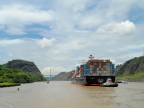  Huge container ship enters cut in Continental Divide on Panama Canal