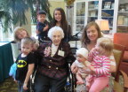  Edith surrounded by her great-grandkids
