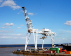  Crane waits to move containers between ship and shore, Buenos Aires

