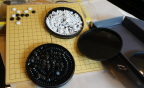  Travel go set with magnetic stones in flat plastic containers
